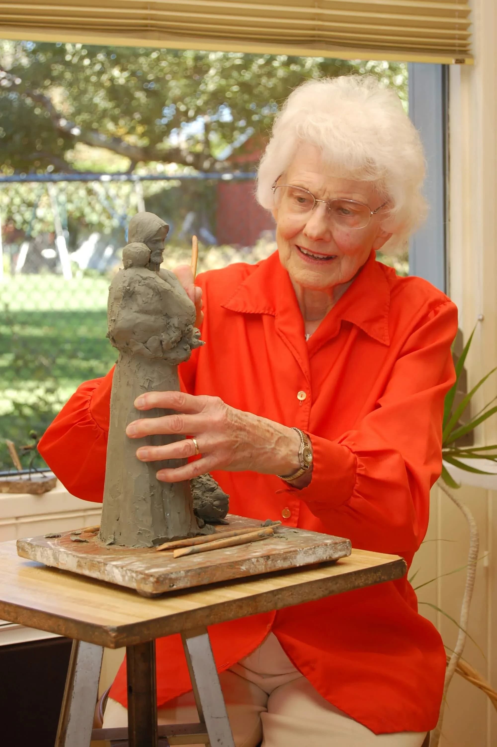 Florence Hansen with a porcelain figurine